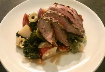 Grilled Natural Beef Tri Tip Steak with Red Potatoes, Braised Kale, Lemon and Olives