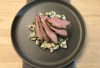 Grilled Natural Beef Tri Tip Steak over Cauliflower “Risotto” with Sautéed Garlic Spinach and Mushrooms